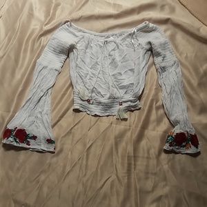 Festival season off-the-shoulder embroidered top